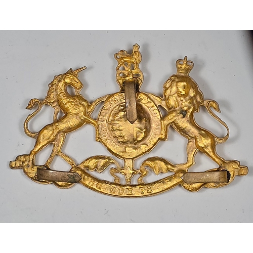 229 - A ER11 household cavalry gilt pouch badge, with bend-over prong fittings. VGC.