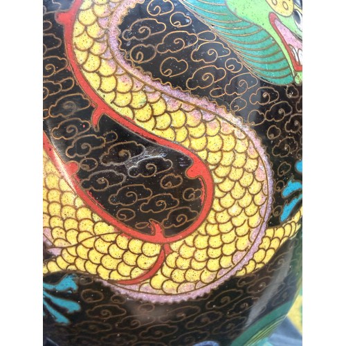 36 - A pair of oriental cloisonné vases, finished in bright colours; yellow, blue/green, yellow, and red,... 