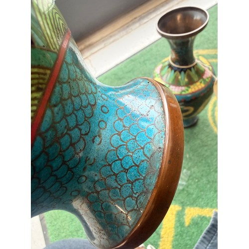 36 - A pair of oriental cloisonné vases, finished in bright colours; yellow, blue/green, yellow, and red,... 