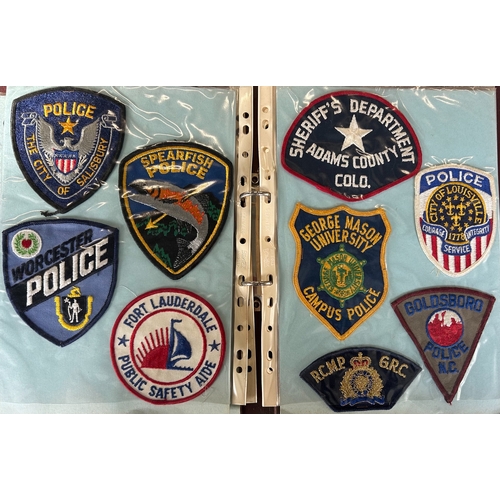 Approx. 130 US Police Dept. embroidered cloth patches. VGC in 2 albums