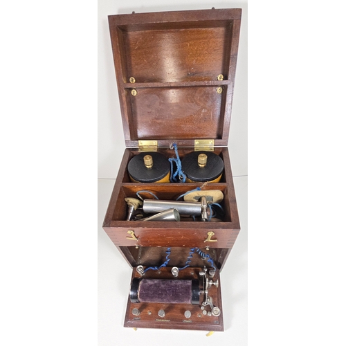 A Victorian/Edwardian medical electric shock machine, in its mahogany ...