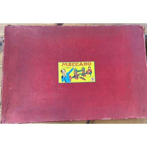 34 - A quantity of 1950's Meccano. Large set No.8 still tied onto the original backing card. Large Access... 
