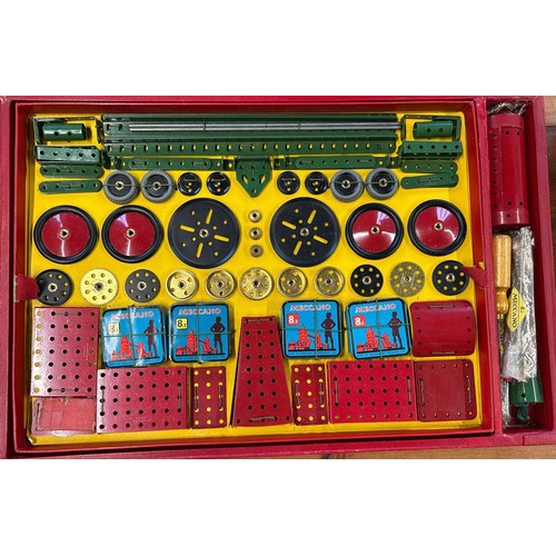 34 - A quantity of 1950's Meccano. Large set No.8 still tied onto the original backing card. Large Access... 