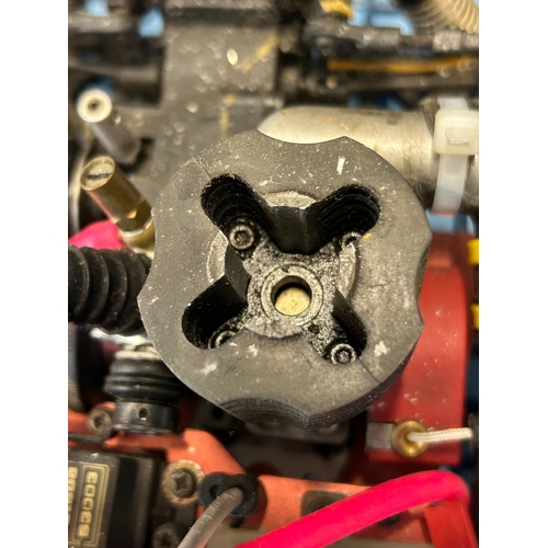 1 - A fuel driven Radio controlled model of a PEUGEOT 206 Rally car, has a vacuum formed pink body with ... 