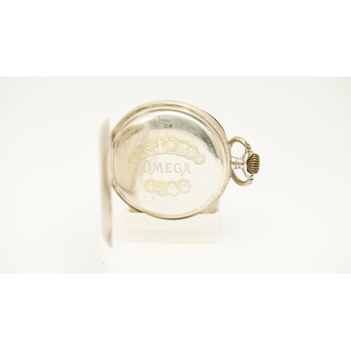 21 - Omega open face pocket watch. Silver case. 49mm. White dial with Arabic numerals and red 24hr markin... 