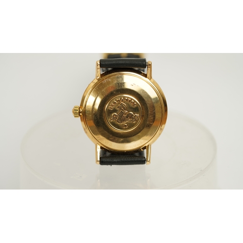 53 - Omega Seamaster Deville in gold. 34mm. Two-tone silver dial with gilt and onyx indices. Automatic mo... 
