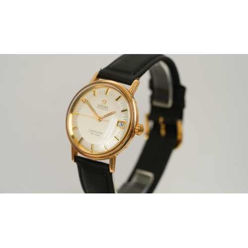 53 - Omega Seamaster Deville in gold. 34mm. Two-tone silver dial with gilt and onyx indices. Automatic mo... 