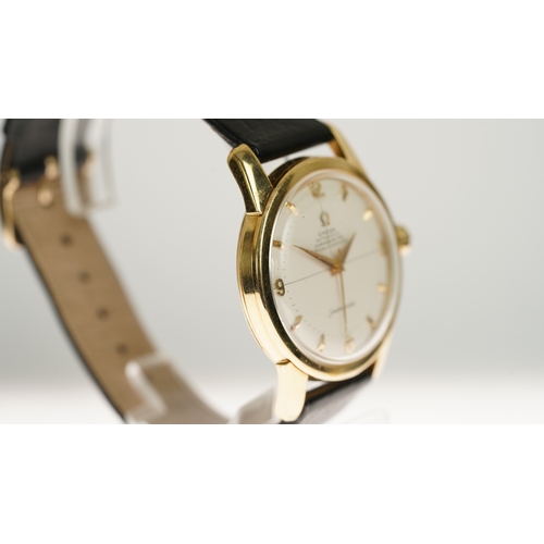 52 - Omega Seamaster Automatic Chronometer in 18kt gold. 34mm. White dial with cross hair, gilt indices. ... 