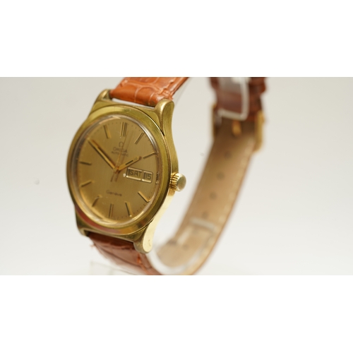 22 - Omega Geneve Automatic in gold plate. 36mm. Reference 166.0169. Gold dial with gilt and onyx indices... 