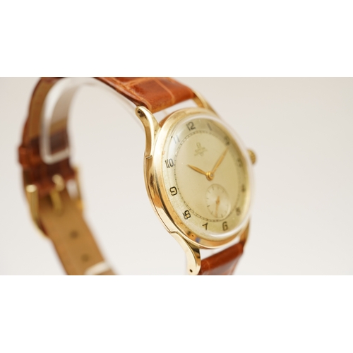 51 - Omega bumper automatic in 14kt gold 'Jumbo' case. 35mm. Silver tone dial with sub-seconds, gilt Arab... 