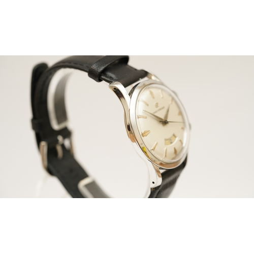 10 - Girard Perregaux Alarm wristwatch in steel. 34mm. White dial with gilt indices, alarm setting window... 