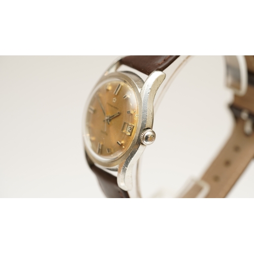8 - Eterna-matic Kontiki in steel. c.1960s. 34mm. Champagne dial with applied indices, date at 3-o'clock... 