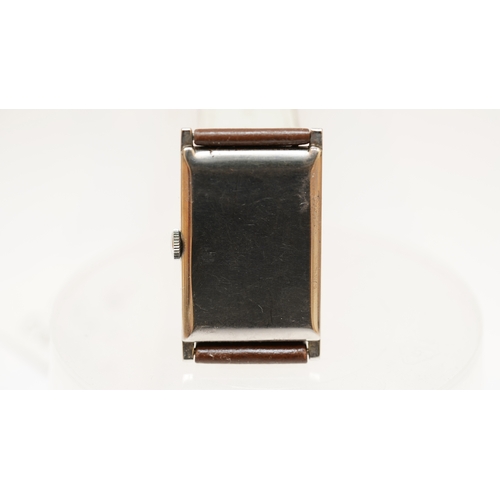 11 - Omega Tank watch in steel, c.1920s-30s. 25mmx42mm. Silvered dial with sub seconds register, luminous... 