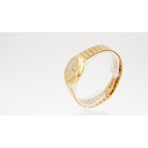 18 - Reference 9707. 32mm case. Integrated 18kt gold bracelet. Gold tone dial marked IWC, International W... 