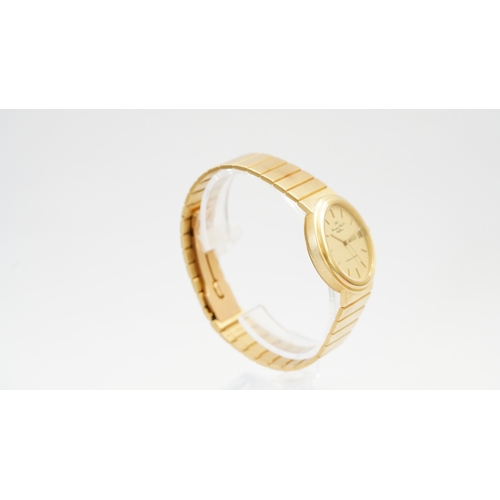 18 - Reference 9707. 32mm case. Integrated 18kt gold bracelet. Gold tone dial marked IWC, International W... 