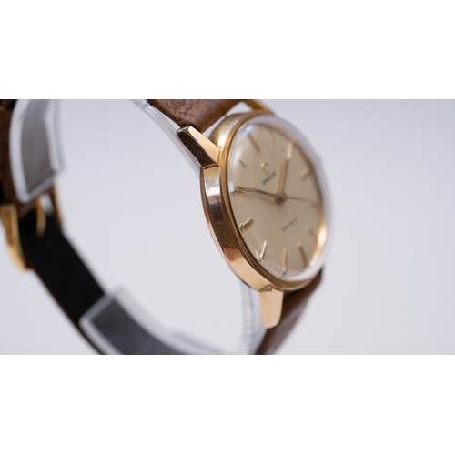 28 - Omega Geneve in gold plate. 32.5mm. Reference 135.012. Manual wind calibre 601 movement. Unsigned cr... 