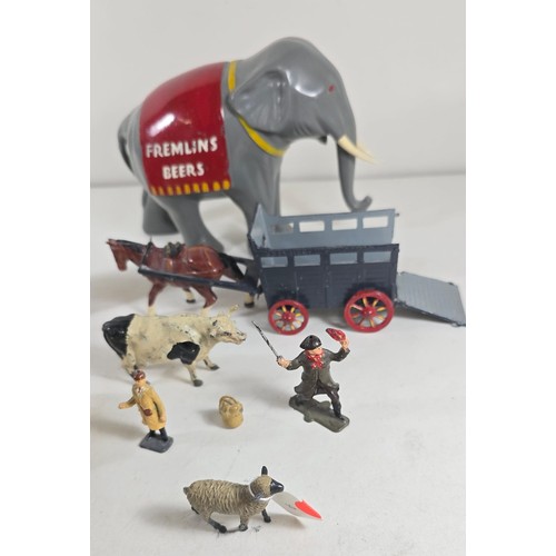35 - A Fremlins Brewery of Maidstone in Kent large grey plastic elephant. 18cm in length from tusk to tai... 