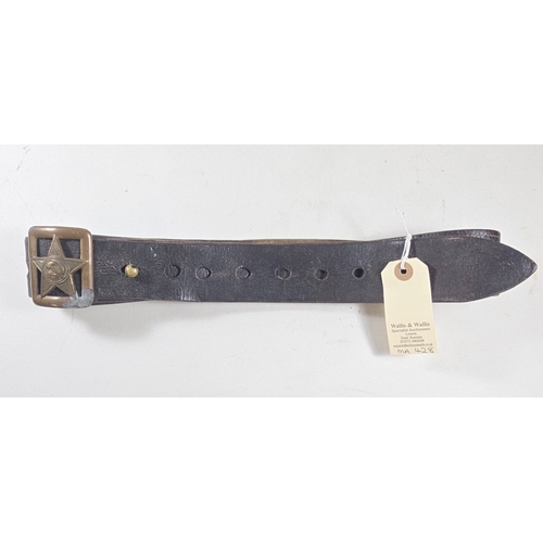 404 - A Soviet Russian leather belt, 4.5cms wide, machine stitched with lenticular panels and fitted with ... 