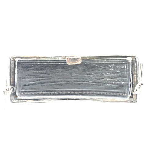507 - A Victorian Cavalry officer's silver fronted pouch belt pouch, the plate bearing B'ham HM for 1876. ... 