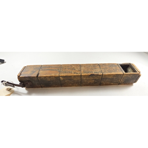 382 - A scarce WW1 American trench periscope, comprising a hollow wooden case 37 x 5.5 x 5cms secured by 7... 