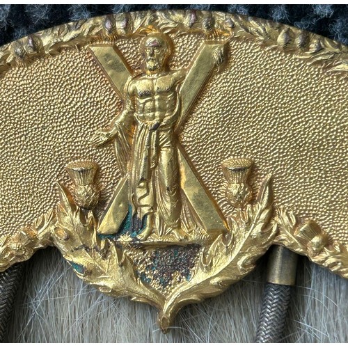 504 - An early 20th century dress sporran, gilt cantle with St Andrew and X In relief together with thistl... 