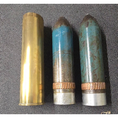 365 - 2x British inert 105mm rounds.one brass shell case marked 1988 105mm RW244.