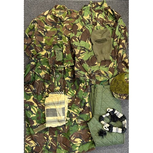 394 - A DPM combat smock, a DPM shirt , a pair of extreme cold weather trousers, An SAS desert type shemag... 