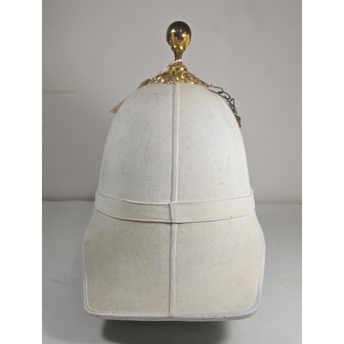 522 - A very scarce Royal Field Artillery Officers foreign service helmet C1890, white cloth with gilt aca... 