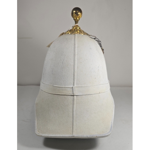 522 - A very scarce Royal Field Artillery Officers foreign service helmet C1890, white cloth with gilt aca... 