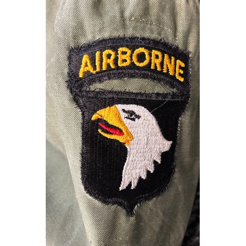 391 - A U.S. vietnam war period tiger stripe combat shirt with special forces insignia. VGC A 1955 Pattern... 