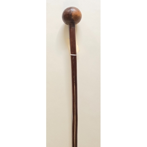 384 - A scarce 19th C. Zulu induna's hardwood staff of rank, 50.5