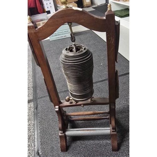 367 - A floor mounted gong, consisting of an air cooled cylinder from an early rotary or radial aircraft e... 