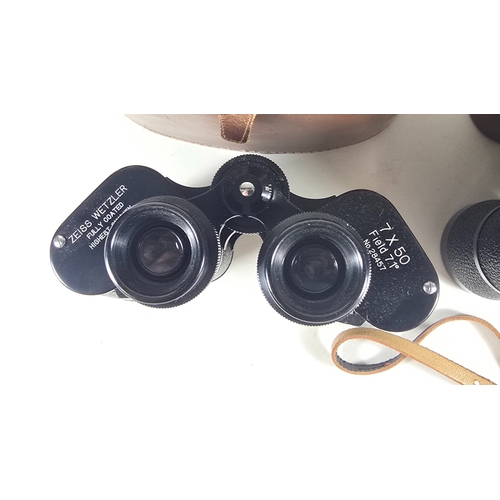368 - A pair of Zeiss Wetzler 7x50 prismatic binoculars, and a pair of Carl Zeiss Jena 10x50 binoculars, b... 