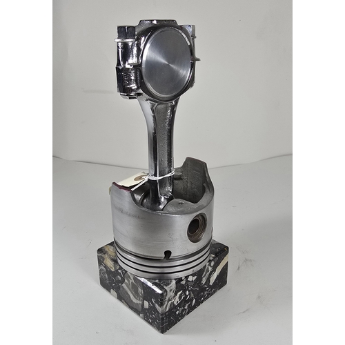 369 - An interesting desk ornament/paper weight made from a Rolls Royce piston and connecting rod, approx.... 