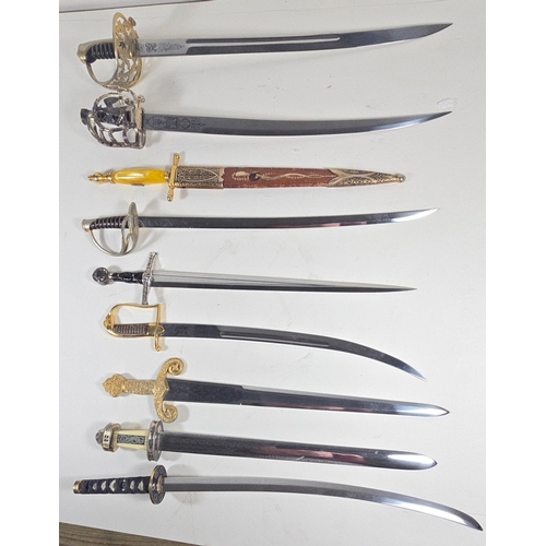 375 - Nine modern miniature swords, including Victorian Cavalry Officer, French Napoleonic, US Cavalry, Me... 