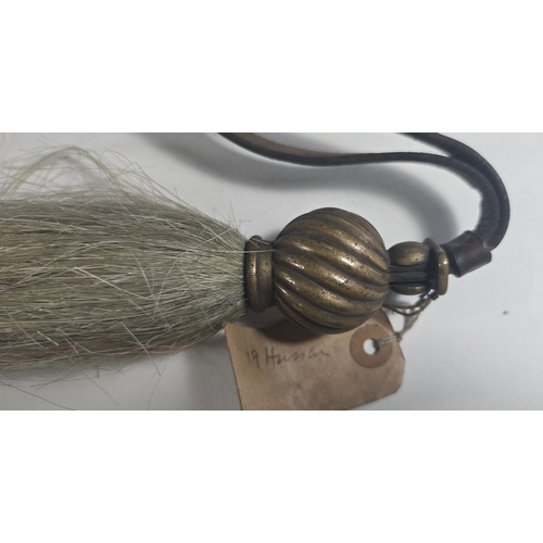 487 - A Cavalry white horse hair Throat Plume of the 19th Hussars, with spiral spherical brass mount and l... 