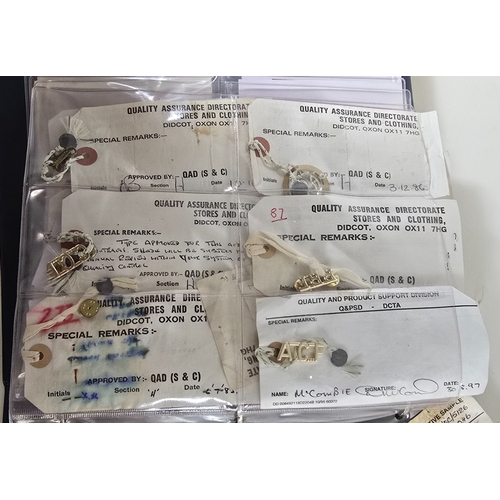 415 - Nineteen London Badge & Button Co. Contractor's Samples for mostly Naval badges, titles and fitt... 