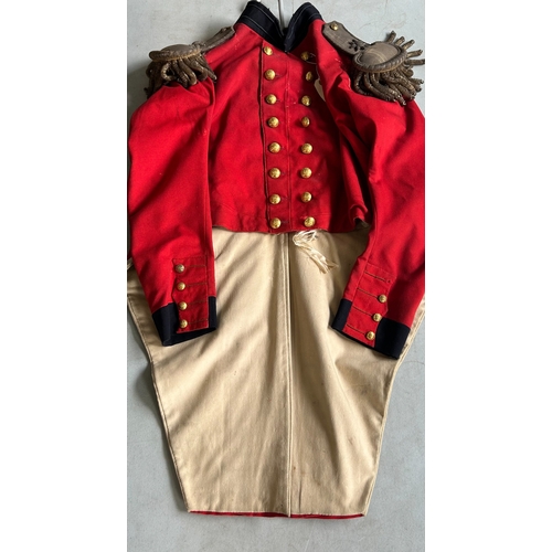 519 - An 1822 pattern Major's Scarlet Coatee with silver bullion epaulettes and coat tail ornaments and gi... 