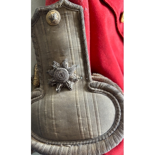 519 - An 1822 pattern Major's Scarlet Coatee with silver bullion epaulettes and coat tail ornaments and gi... 