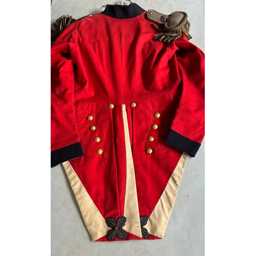 519 - An 1822 pattern Major's Scarlet Coatee with silver bullion epaulettes and coat tail ornaments and gi... 