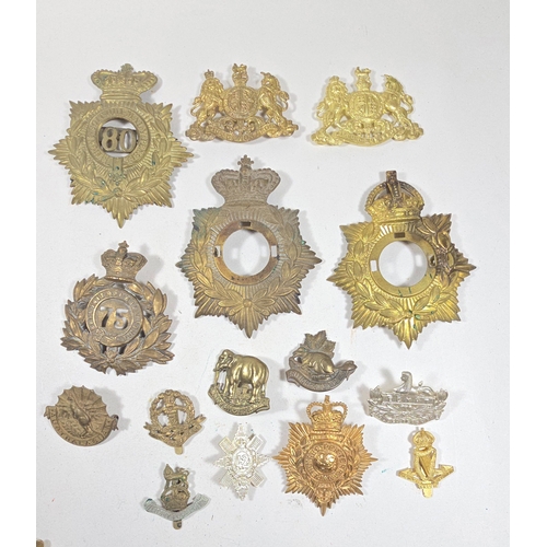 413 - A small quantity of re-strike helmet plates etc. including three 1869 shako plates, 1878-81 OR's HP ... 