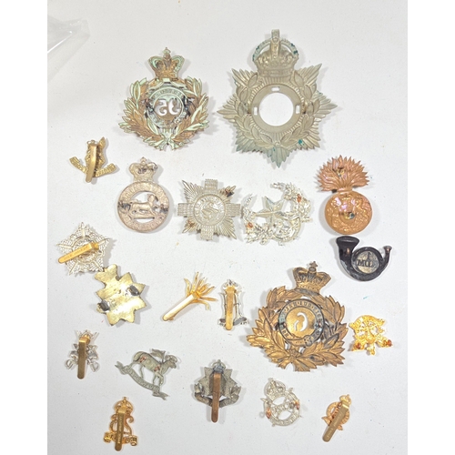 413 - A small quantity of re-strike helmet plates etc. including three 1869 shako plates, 1878-81 OR's HP ... 