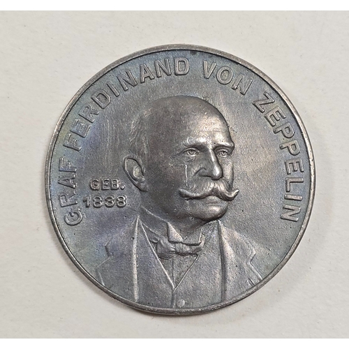 534 - A greymetal medallion depicting Graf Ferdinand von Zeppelin, the reverse showing the airship L.Z.III... 