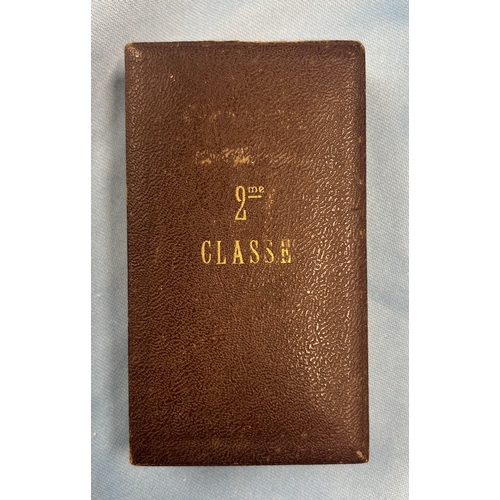 524 - A Belgian 2nd Class enamelled Agricultural Award medal, with suspender and ribbon, in its fitted cas... 