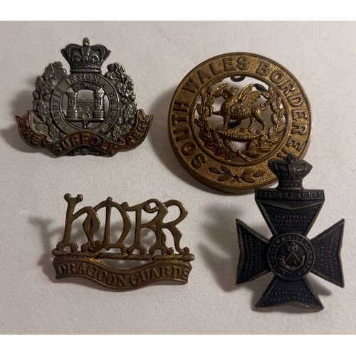 410 - Victorian cap badge of the Suffolk Regiment; collar badge of H.M.R.R. Dragoon Guards (lugs af); smal... 