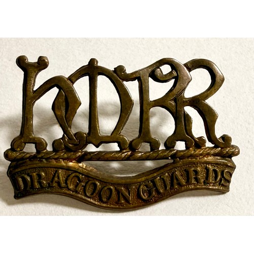 410 - Victorian cap badge of the Suffolk Regiment; collar badge of H.M.R.R. Dragoon Guards (lugs af); smal... 