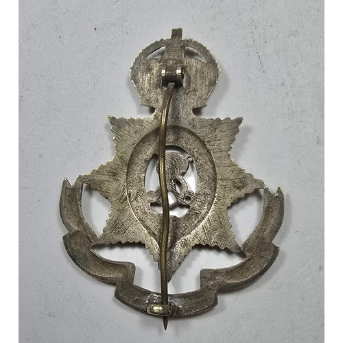 412 - An Indian mess servants white metal pugri badge of the Indian medical service, with pin fitting. GC