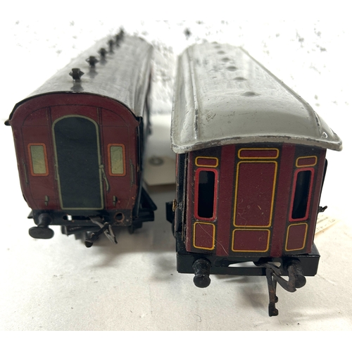 33 - 2 O Gauge Passenger Coaches. A Bing LMS 8 wheeled Dining Car, an example with 4 opening end doors, f... 
