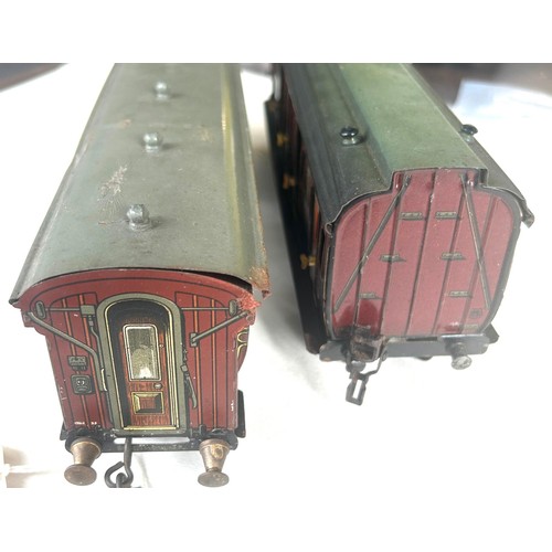 34 - 2 O Gauge Passenger Coaches. An early Marklin LMS 1st/3rd 8 wheeled bogie Passenger Coach. In LMS Cr... 
