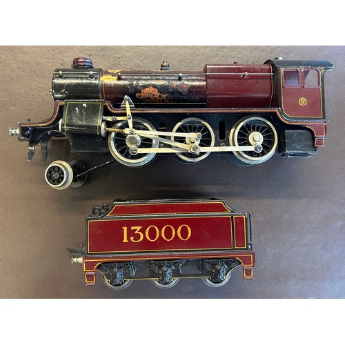 37 - A live steam Bassett-Lowke LMS 2-6-0 Tender Locomotive. An example in lined maroon Crimson Lake and ... 